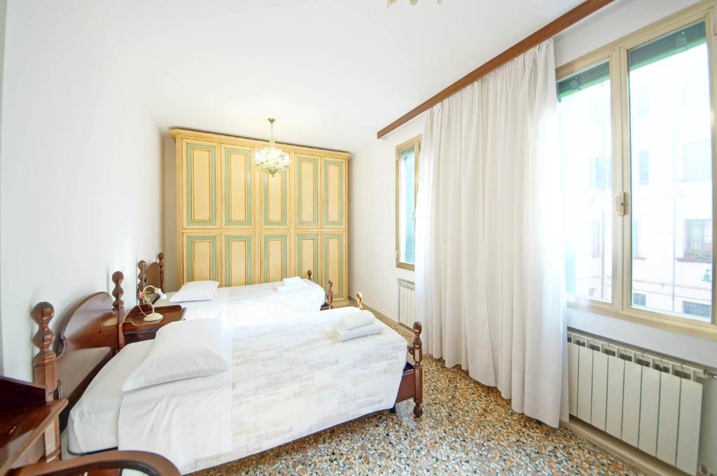 Posteľ alebo postele v izbe v ubytovaní DolceVita Apartments N 496