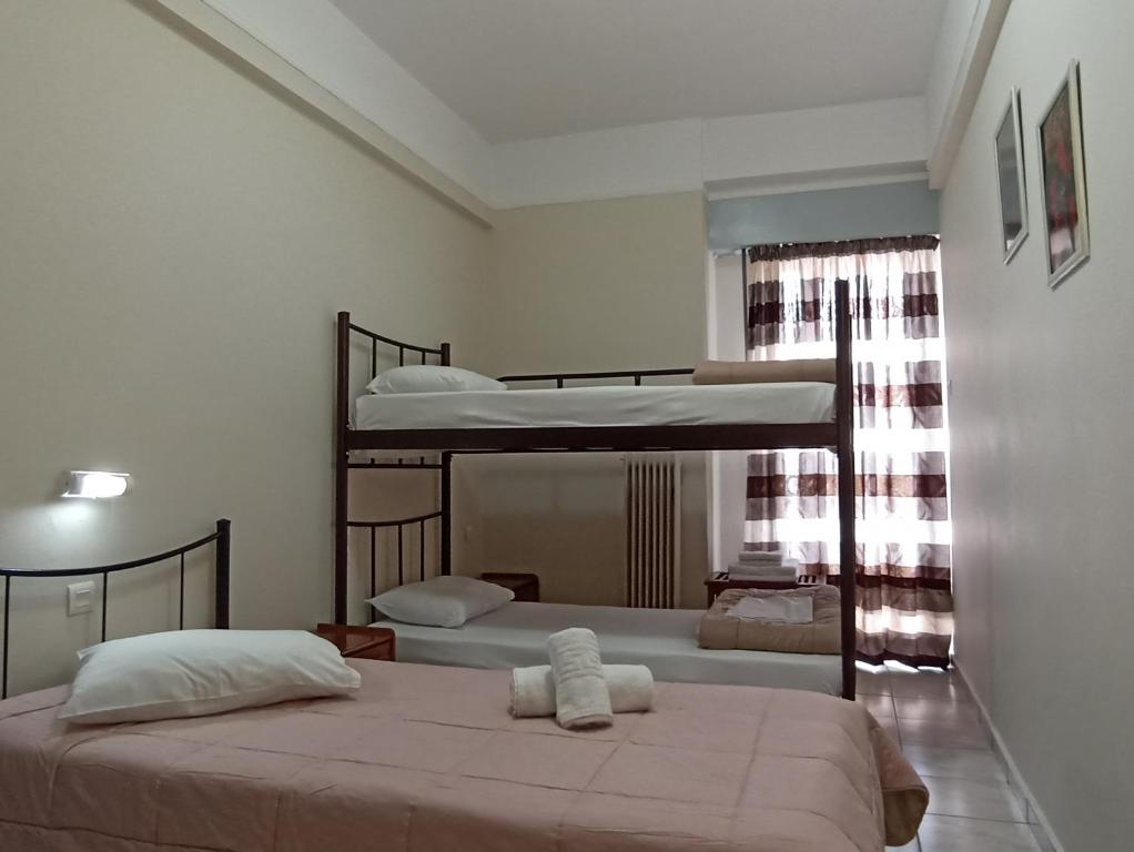 Postel nebo postele na pokoji v ubytování Elite Hotel