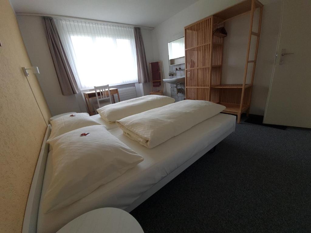 Postel nebo postele na pokoji v ubytování Haus St.Michael