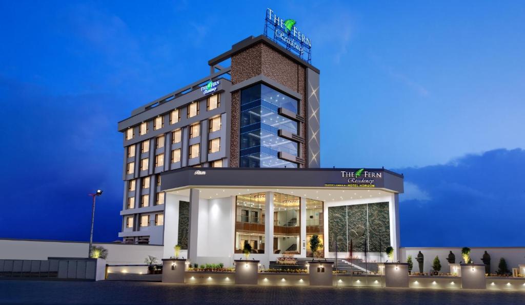 a rendering of the hotel franklin at night at The Fern Residency Somnath in Somnath
