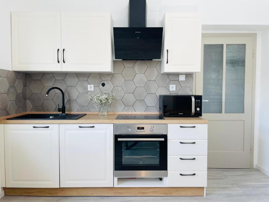 Kuchyň nebo kuchyňský kout v ubytování Apartma Srečko, Sežana