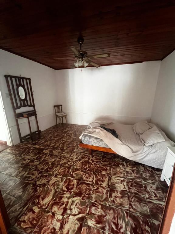 Tempat tidur dalam kamar di Paraná