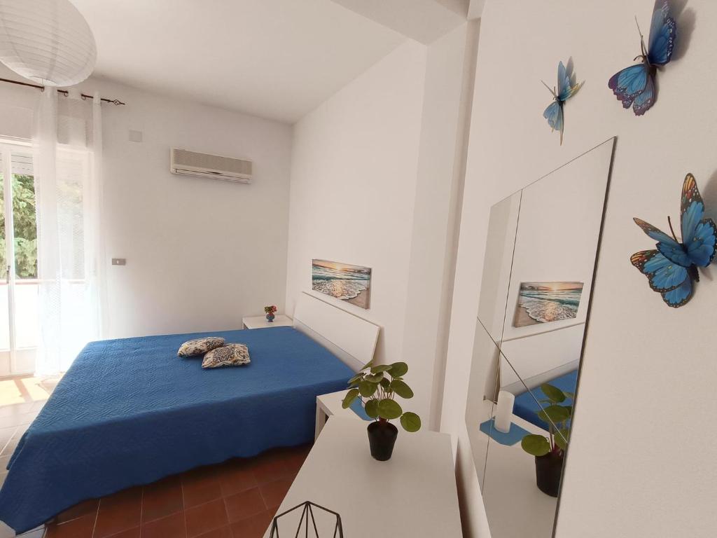 Posteľ alebo postele v izbe v ubytovaní Perla Home Speciale Vacanze 2025 Casa perfetta per gruppi coppie e famiglie vivi la Sicilia a modo tuo