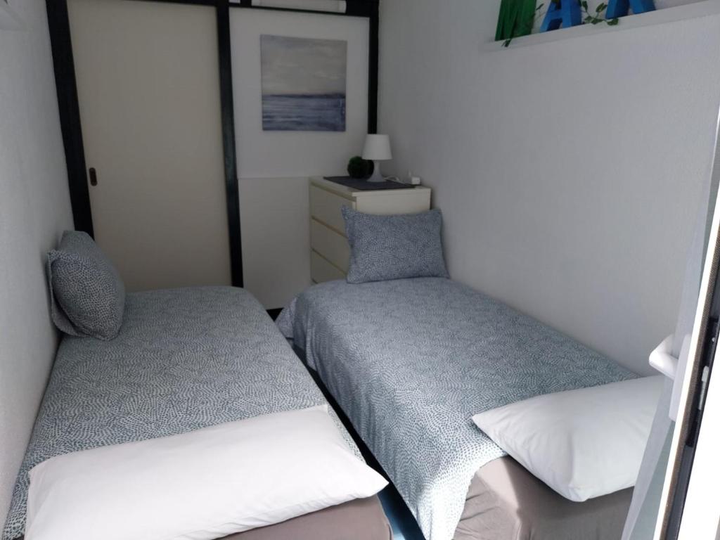 Postel nebo postele na pokoji v ubytování APARTAMENTO con TERRAZA VISTAS AL MAR
