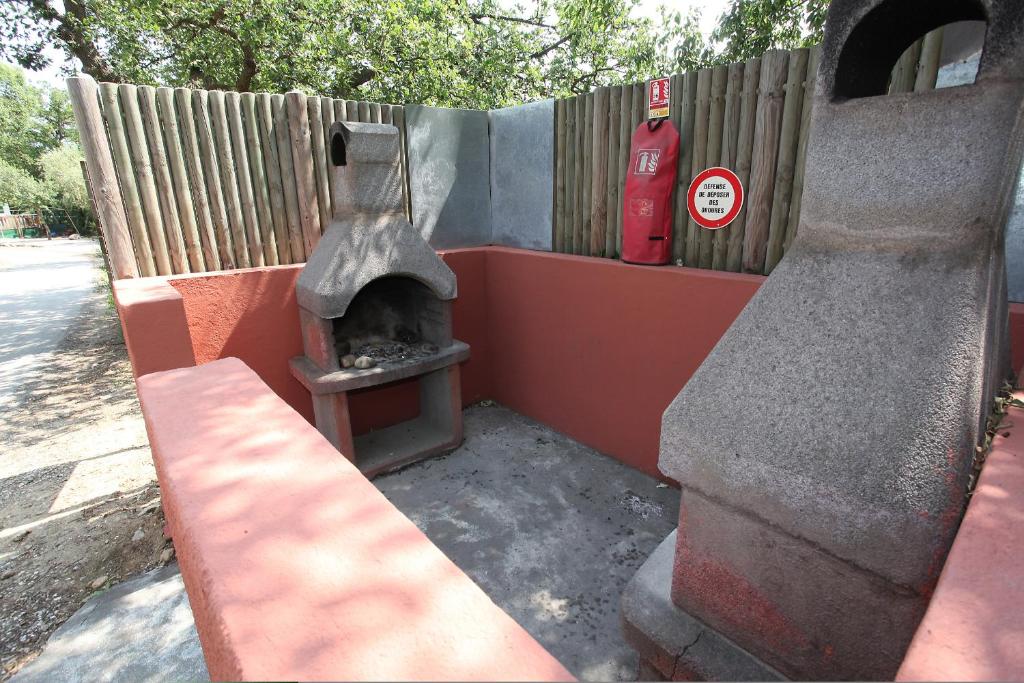 Posezení v ubytování Camping Le Bois Fleuri