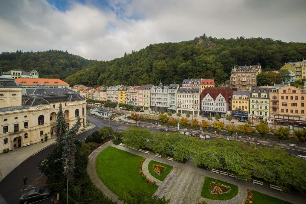 a view of a city with buildings and a street at Interhotel Central in Karlovy Vary