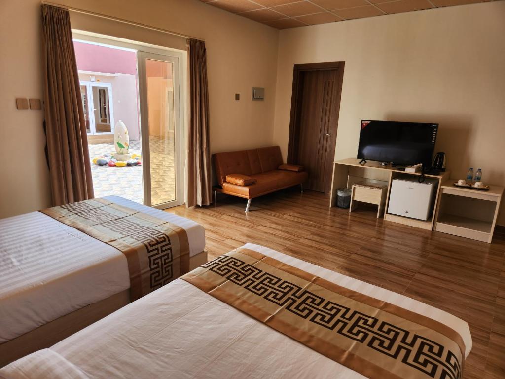 Postel nebo postele na pokoji v ubytování Lina Dreamland Resort