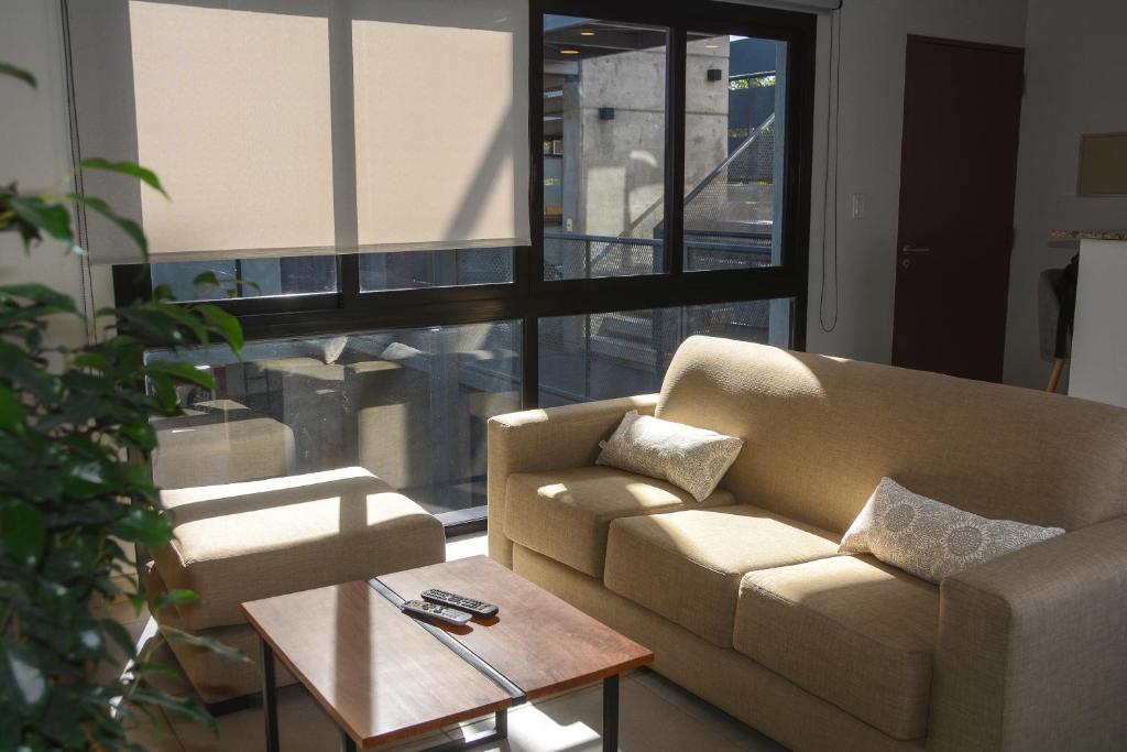 Posezení v ubytování Hermoso departamento cómodo y equipado!