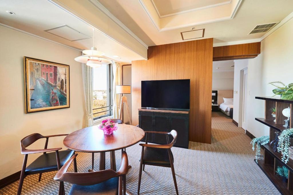 TV a/nebo společenská místnost v ubytování Hotel Crystal Palace