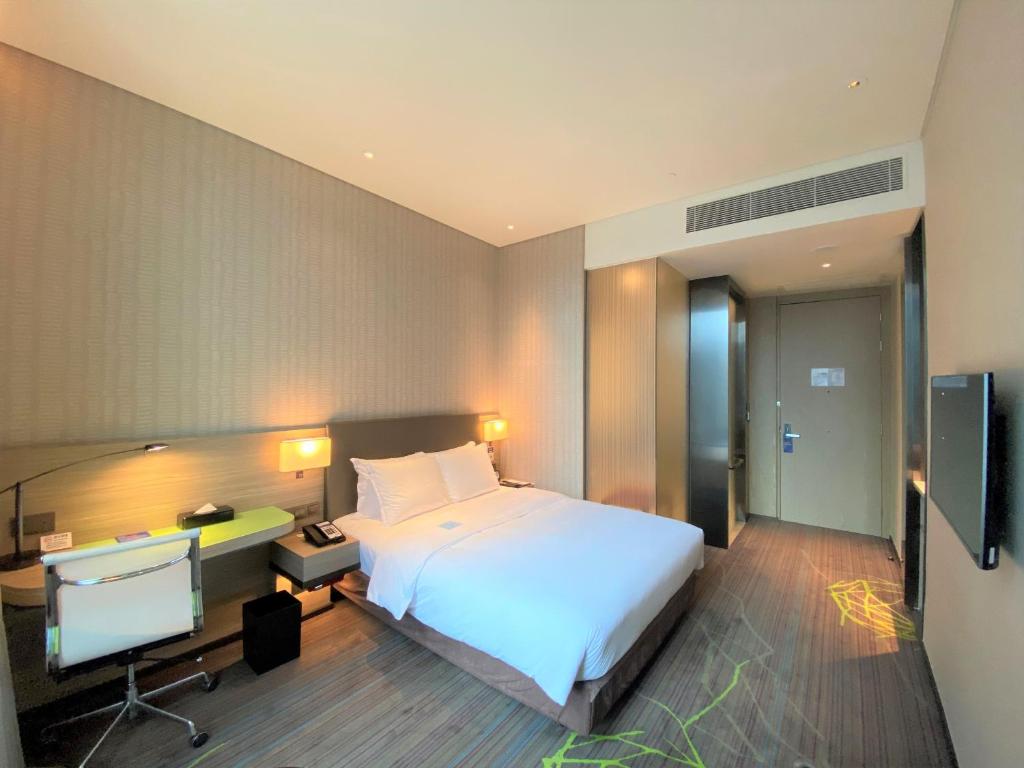 TV a/nebo společenská místnost v ubytování Holiday Inn Express Hong Kong Kowloon CBD2 by IHG