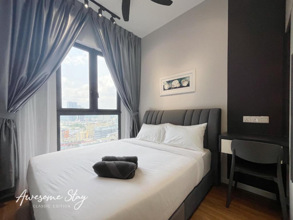 Ліжко або ліжка в номері Sunway Velocity Two By Awesomestay