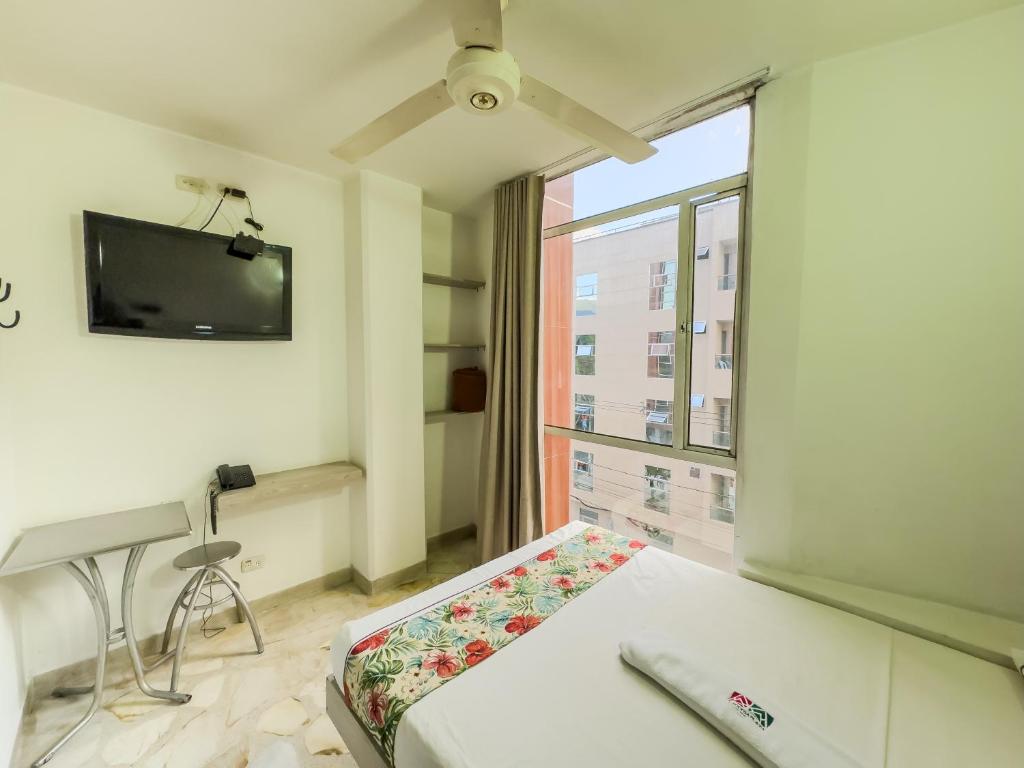 TV a/nebo společenská místnost v ubytování Hotel Macedonia Plaza Medellin