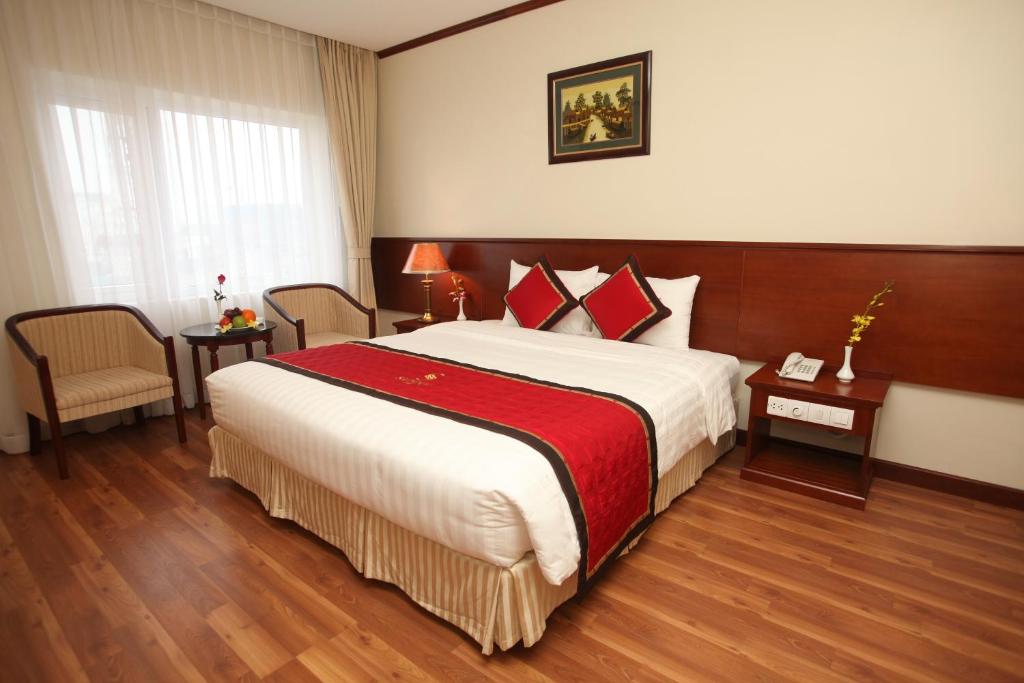 Postel nebo postele na pokoji v ubytování S79 Sunny Hotel 2