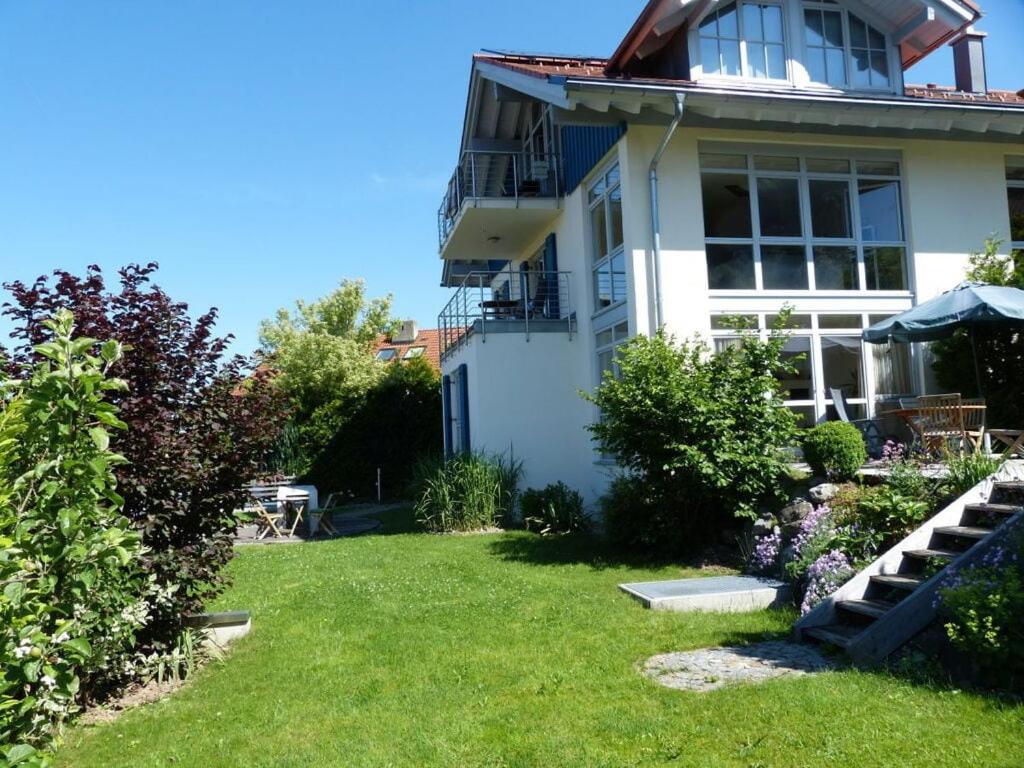 a house with a lawn in front of it at Lovely holiday home near the ski-area in Missen