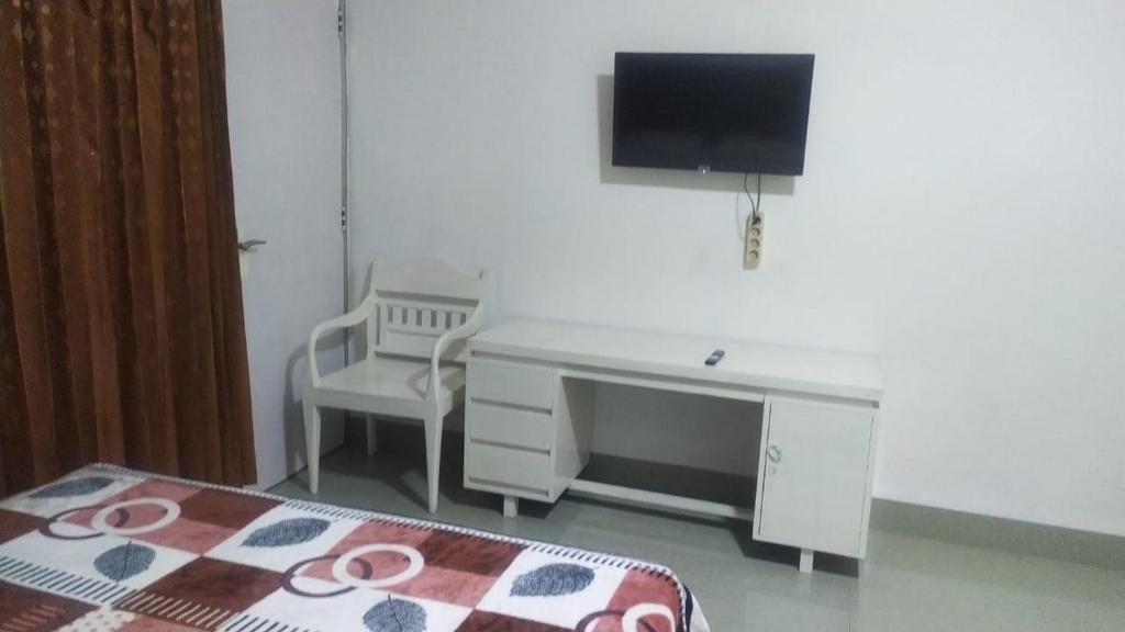Kostel Satu Semarang RedPartner - Deluxe Room