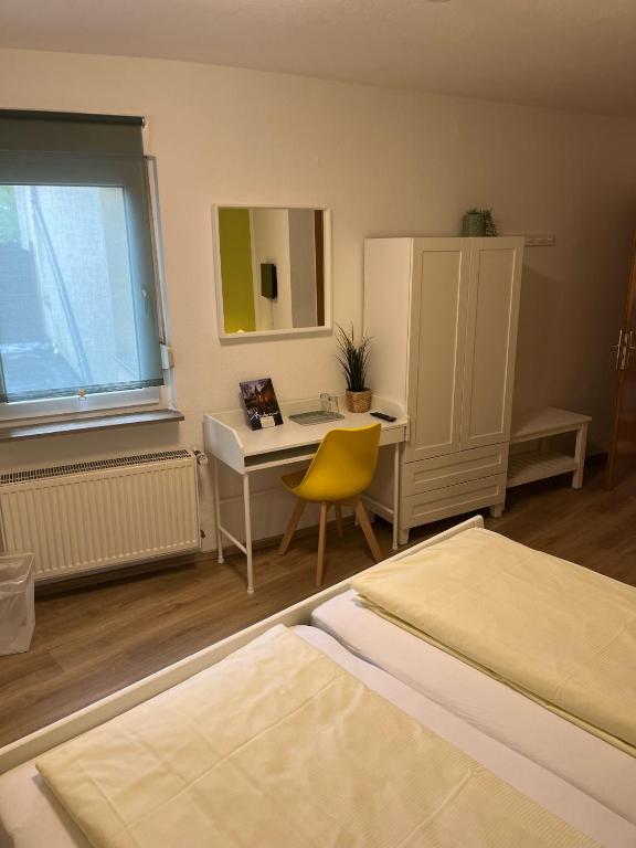 Postel nebo postele na pokoji v ubytování Gasthaus Stammbaum