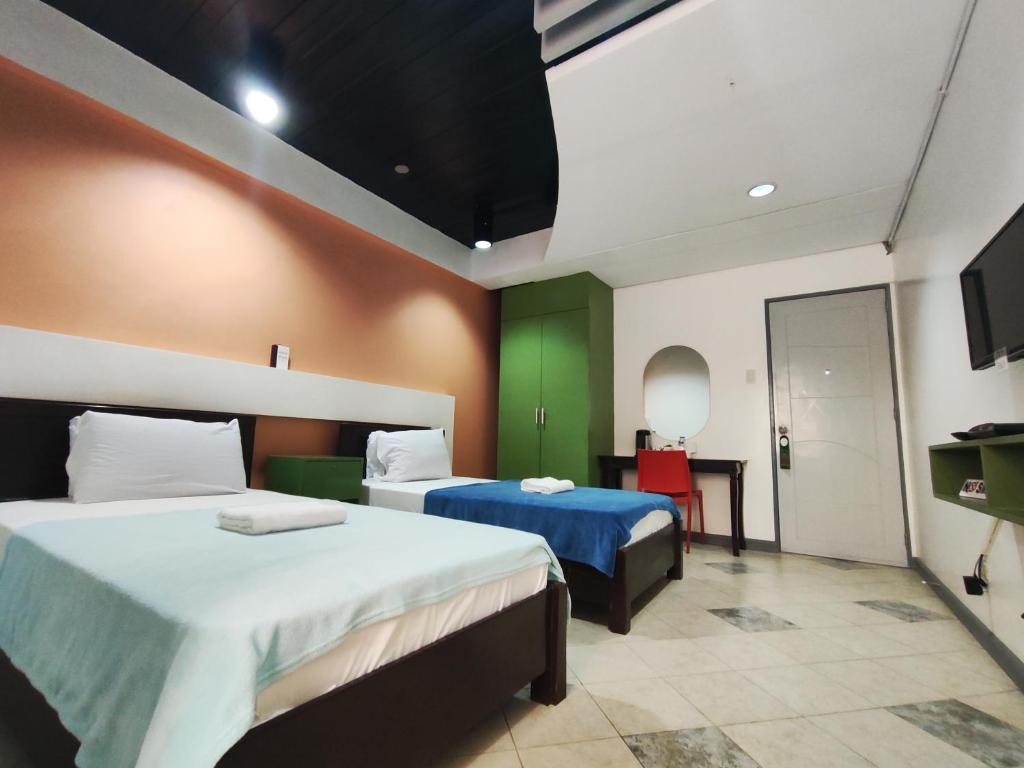 Postelja oz. postelje v sobi nastanitve Balai Subik Hotel
