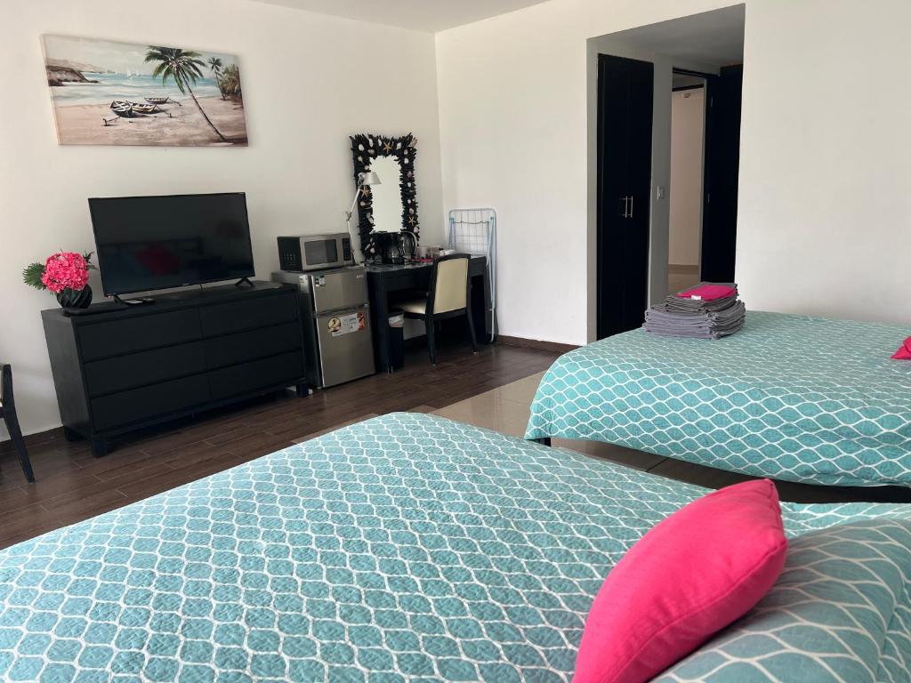 Town Center Paradise in Playa Blanca - Habitación Cuádruple Clásica