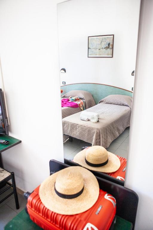 Postel nebo postele na pokoji v ubytování Hotel La Torretta Bramante
