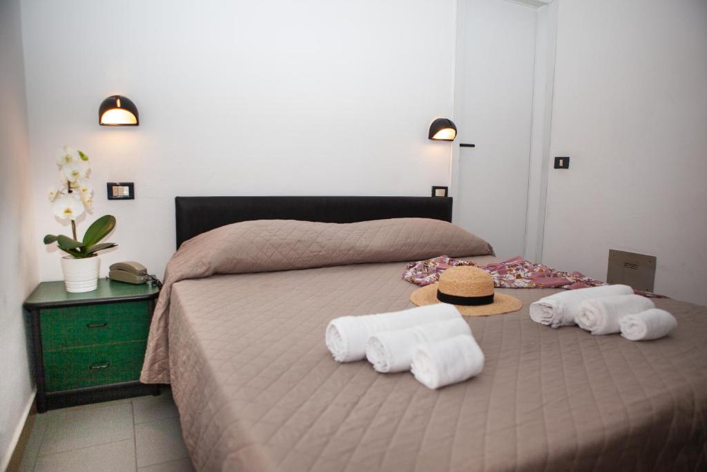 Postel nebo postele na pokoji v ubytování Hotel La Torretta Bramante