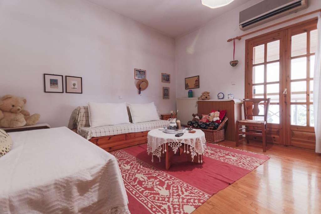 En eller flere senge i et værelse på Zeusplace Magic Pool Villa