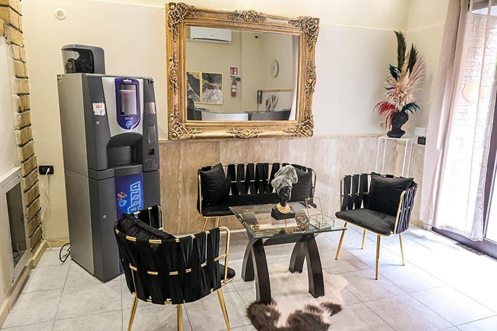 Kuchyň nebo kuchyňský kout v ubytování Suisse hotel