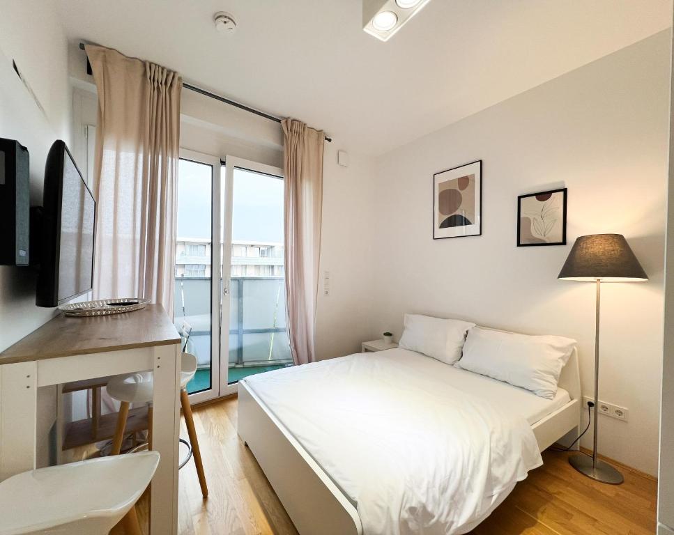 Posteľ alebo postele v izbe v ubytovaní MyRoom Apartment in Munich