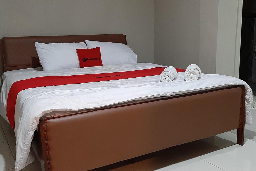 Katil atau katil-katil dalam bilik di RedDoorz At Hotel Pakem Sari Kaliurang