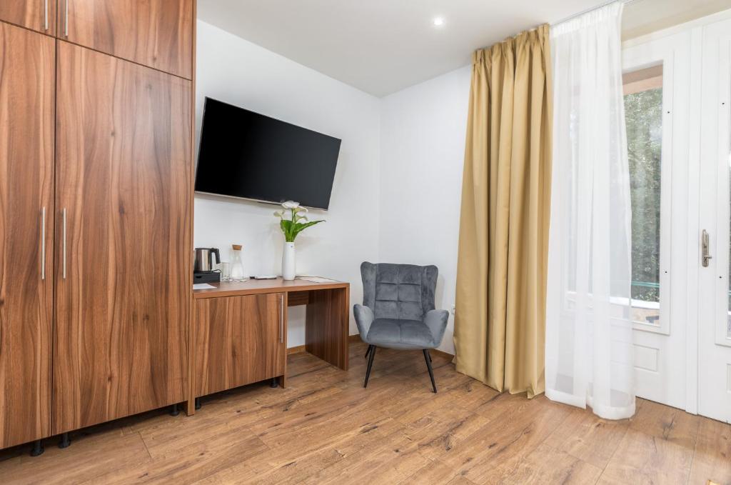 TV a/nebo společenská místnost v ubytování Brijuni Hotel Neptun
