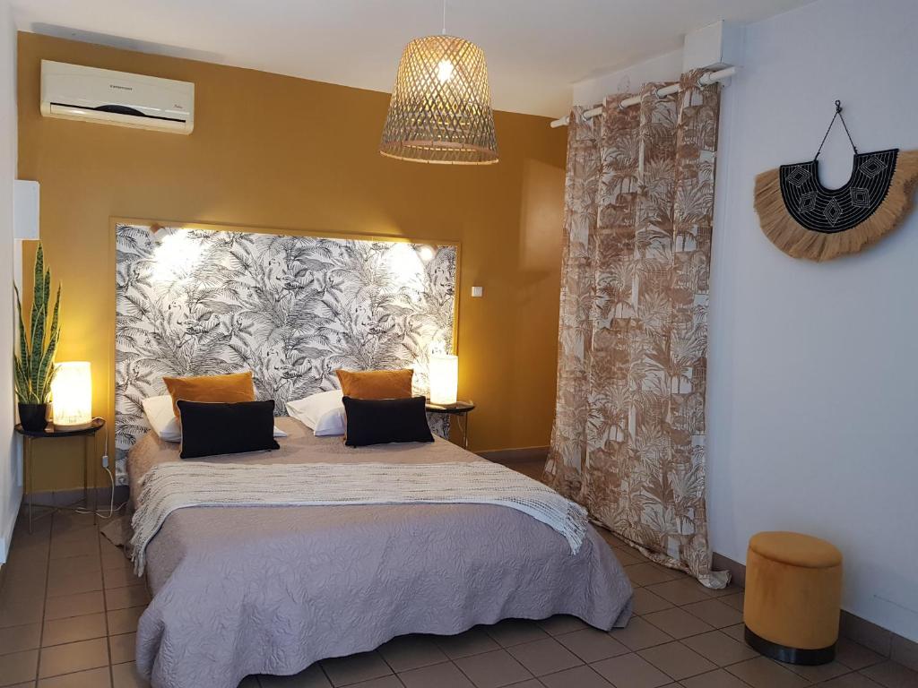 Katil atau katil-katil dalam bilik di 3 - LE VACOA - CHAMBRE 3 - Rdc D