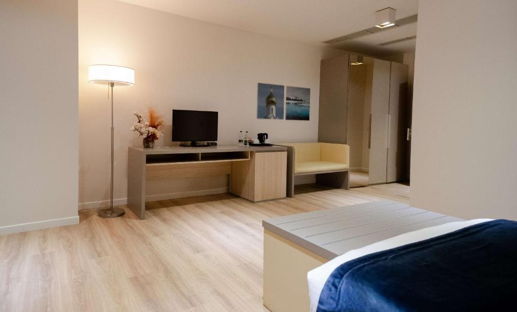 TV a/nebo společenská místnost v ubytování Best Western Premier Ark Hotel