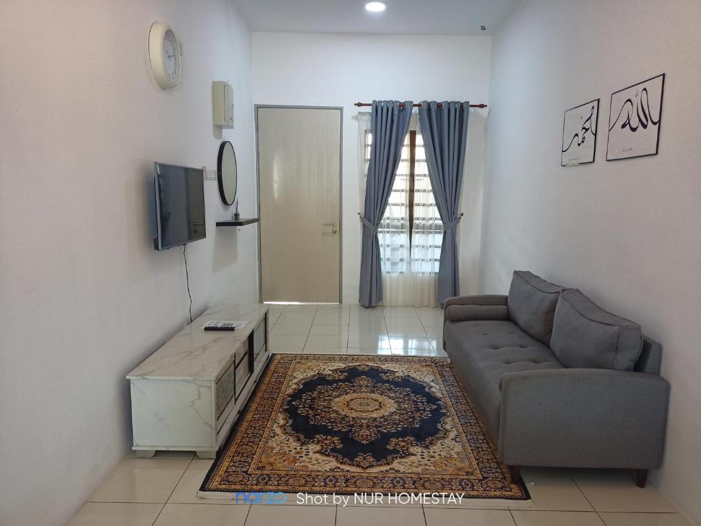 Fotografie z fotogalerie ubytování Nur’s Homestay v destinaci Kuala Kelawang