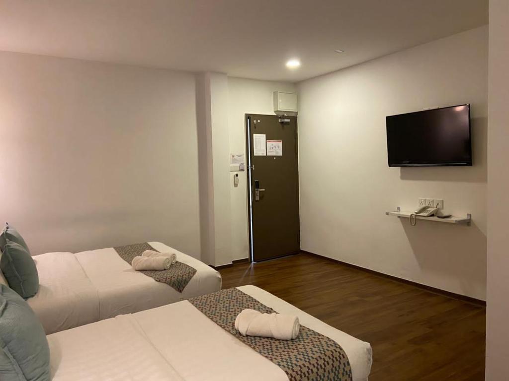 TV a/nebo společenská místnost v ubytování HOTEL LONGHOUSE
