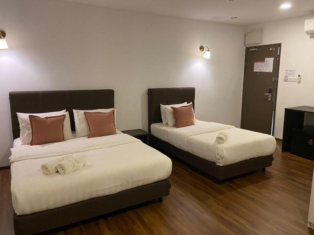 Postel nebo postele na pokoji v ubytování HOTEL LONGHOUSE