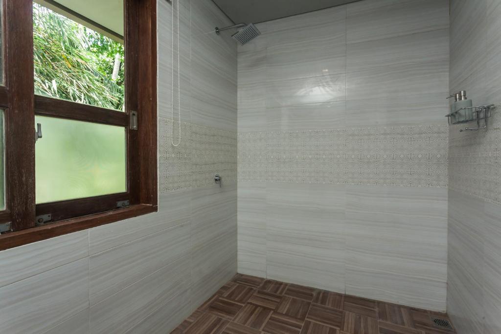 Koupelna v ubytování Teba Suci Suite and Villas