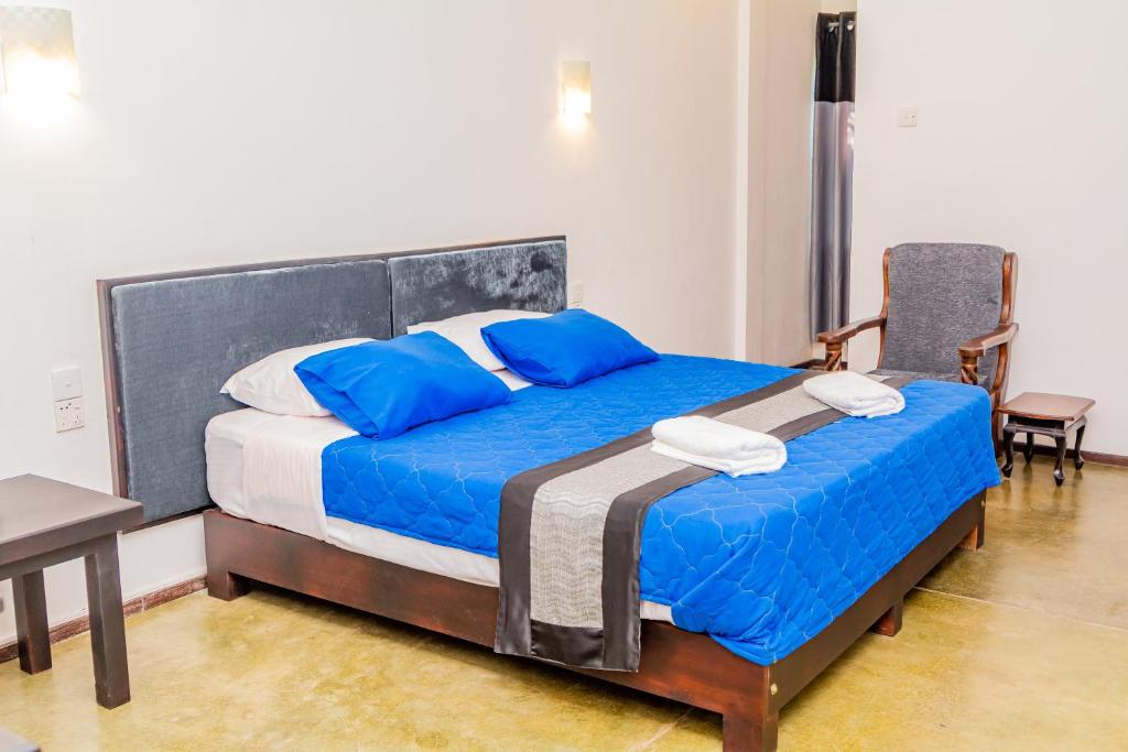 Postel nebo postele na pokoji v ubytování ShiCo Transit Hotel