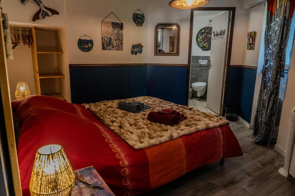 Postel nebo postele na pokoji v ubytování Le Moulin de Pascale