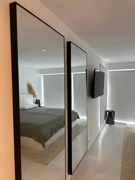 Postel nebo postele na pokoji v ubytování Sun Club P65 Premium Bungalow