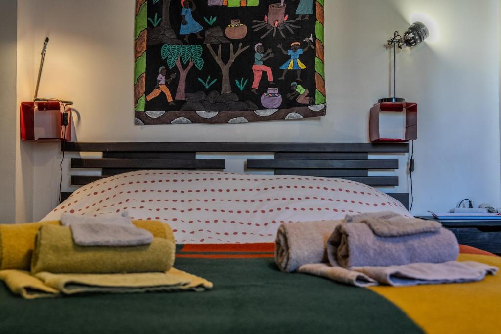 Postel nebo postele na pokoji v ubytování Le Moulin de Pascale