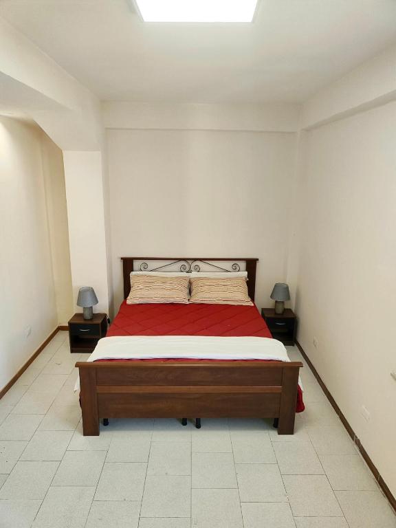 Postel nebo postele na pokoji v ubytování FONDO VERSACE