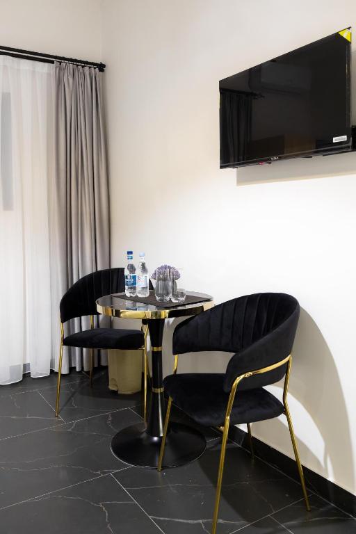 TV a/nebo společenská místnost v ubytování EVN Rooms