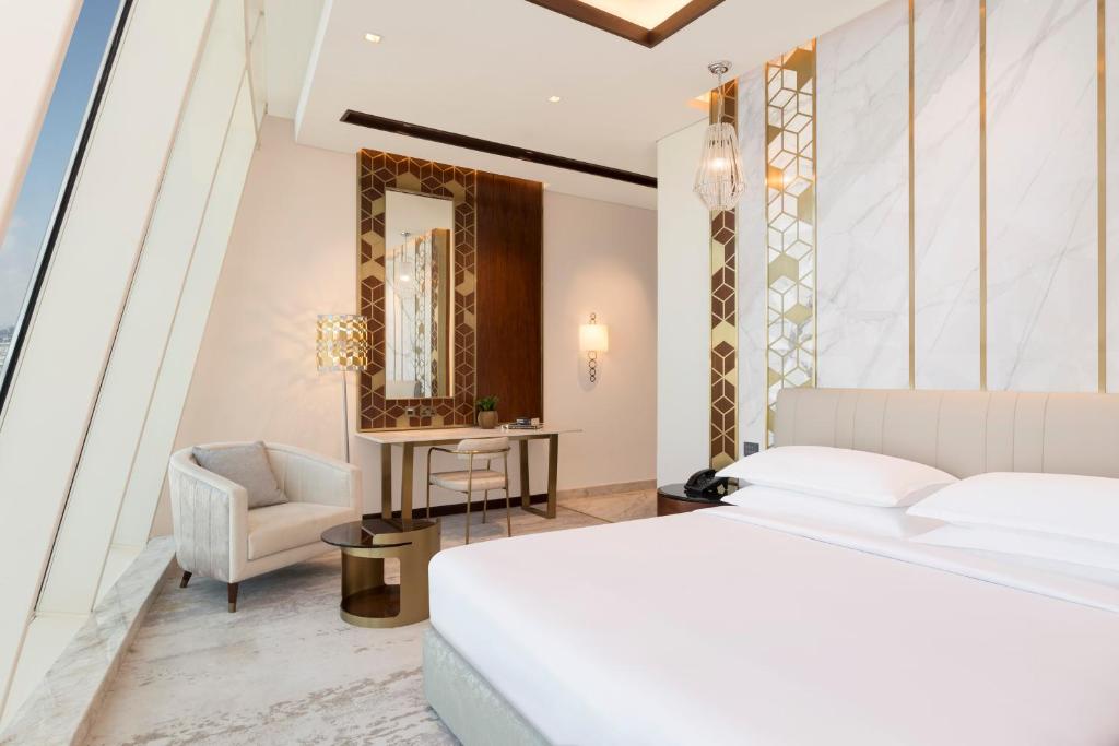 Postelja oz. postelje v sobi nastanitve Velero Hotel Doha Lusail