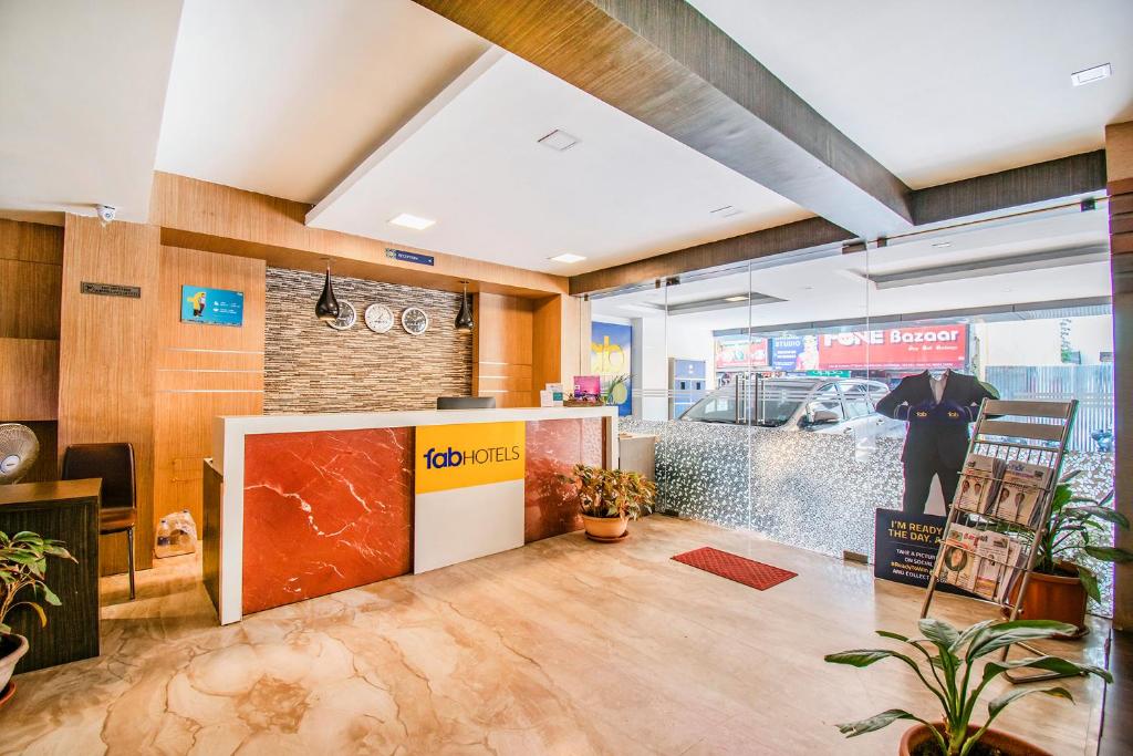 Fotografie z fotogalerie ubytování FabHotel Jansi Deluxe - Nr Gandhipuram Bus stand v destinaci Kójamputtúr