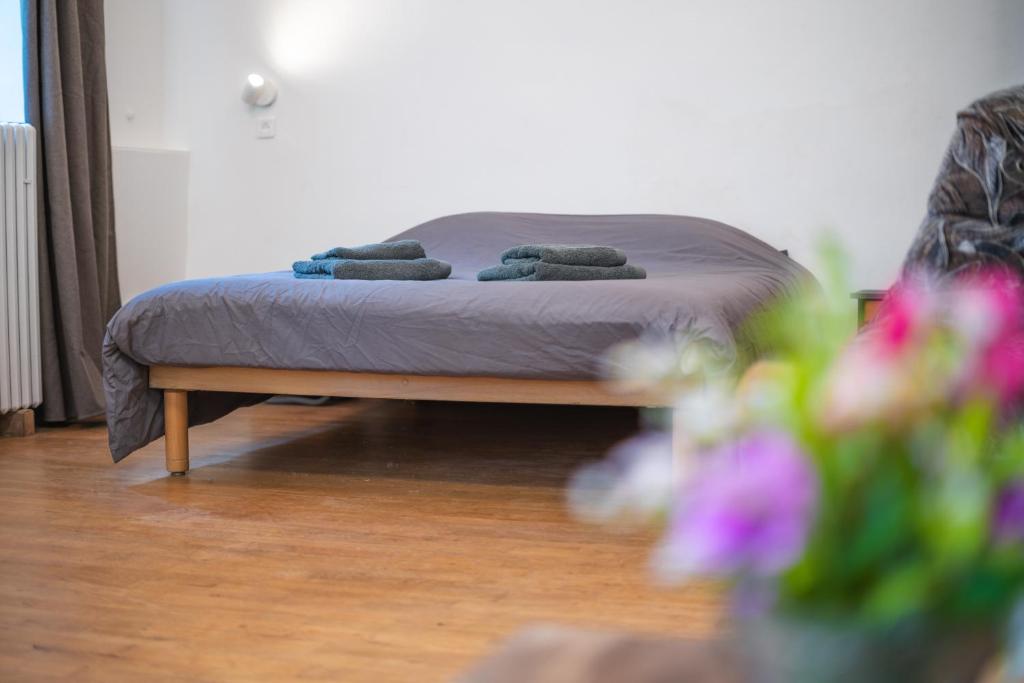 Postel nebo postele na pokoji v ubytování Monastère du Val de Consolation