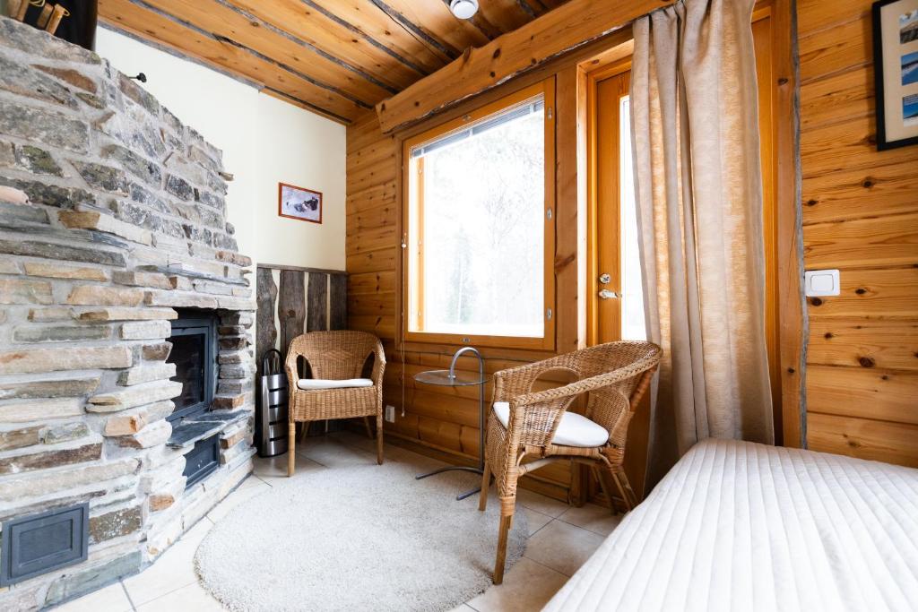 Postel nebo postele na pokoji v ubytování Pyhäkoti Holiday Home