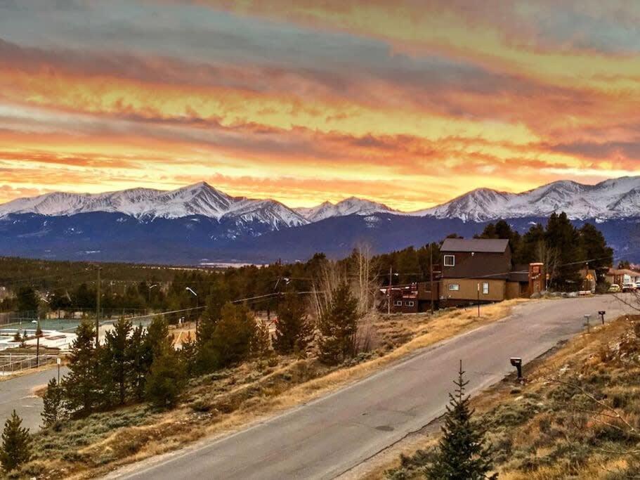 an empty road with mountains in the background at The Hilltop Haven 2bd Suite and Pet Friendly in Leadville