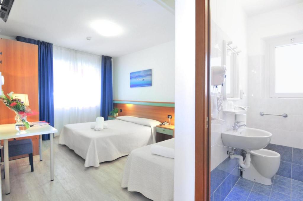 Koupelna v ubytování Hotel Rex