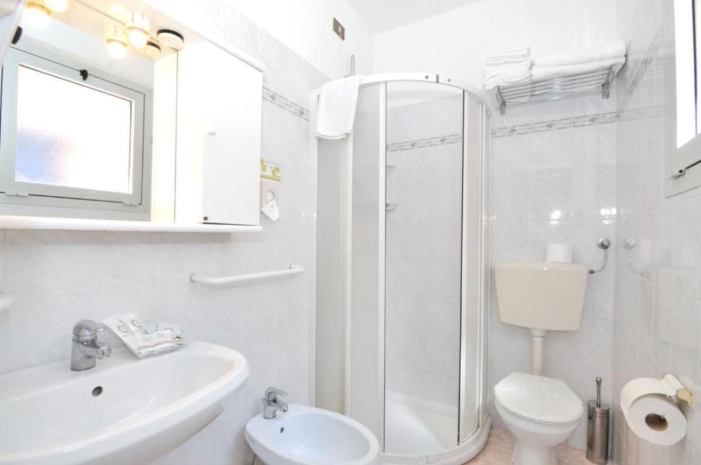 Koupelna v ubytování Hotel Rex