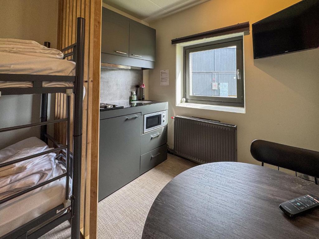 Kuchyň nebo kuchyňský kout v ubytování Jönköping Hotel Apartments
