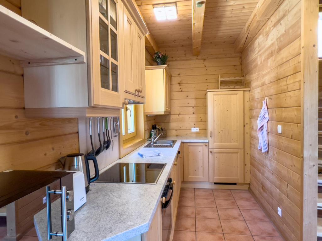 Kuchyň nebo kuchyňský kout v ubytování 1A Chalet Enzianhuette - Wandern und Indoor Sauna